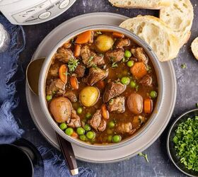 lamb stew crock pot, Crock Pot Lamb Stew in a bowl from above with a slow cooker and bread beside