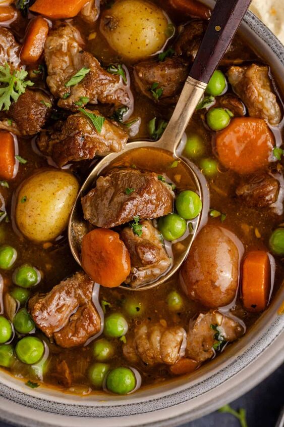 lamb stew crock pot, Crock Pot Lamb Stew close up in a bowl from above with a spoon in it