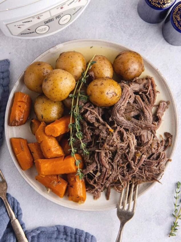 lamb stew crock pot, Pot Roast Slow Cooker Recipe all shredded on plate with carrots and potatoes
