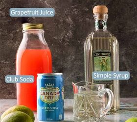 paloma cocktail recipe, side shot of the ingredients used to make this paloma cocktail recipe Tequila grapefruit juice limes club soda and simple syrup