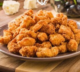 keto chicken nuggets low carb nugget recipe, a large pile of keto chicken nuggets on a plate