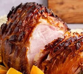 pork prime rib, Honey Ham on a platter partially sliced