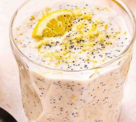 easy carrot cake muffins with cheesecake filling no frosting needed, Creamy lemon poppy seed overnight oats in a clear glass cup garnished with fresh berries and lemon zest for a bright breakfast