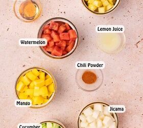 the best mexican fruit salad with tajin seasoning, Fresh watermelon pineapple mango cucumber jicama lime juice chili powder honey and Taj n seasoning arranged for Mexican fruit salad