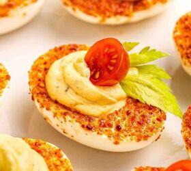 the best bloody mary deviled eggs recipe easy brunch appetizer, Detailed view of deviled egg whites coated in Taj n and filled with smooth Bloody Mary yolk mixture