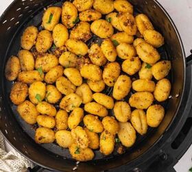 the best bloody mary deviled eggs recipe easy brunch appetizer, Golden and crispy potato gnocchi straight from the air fryer garnished with fresh parsley and Parmesan