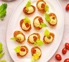 the best bloody mary deviled eggs recipe easy brunch appetizer, Colorful platter of Bloody Mary deviled eggs garnished to resemble a classic Bloody Mary cocktail