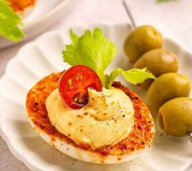 the best bloody mary deviled eggs recipe easy brunch appetizer, Close up of rich and creamy Bloody Mary deviled egg filling piped into seasoned egg whites