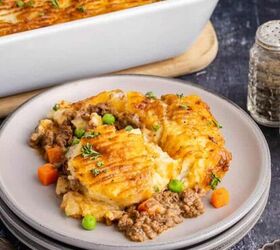 chicken broccoli and rice casserole, Cottage Pie Recipe on a plate and the casserole dish in the back