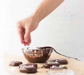 cashew butter reese s eggs gluten free and dairy free recipe, Hand adding sprinkles to Gluten Free and Dairy Free Cashew Butter Reeses Eggs