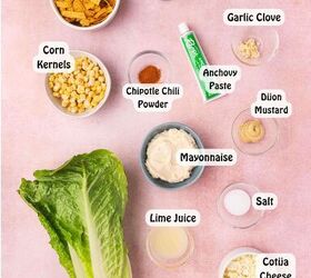 easy mexican caesar salad recipe with creamy lime dressing, Assorted ingredients including romaine lettuce tortilla strips Cotija cheese corn kernels mayonnaise lime juice Dijon mustard Worcestershire sauce garlic anchovy paste and chipotle chili powder arranged for making Mexican Caesar salad dressing and toppings