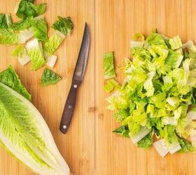 easy mexican caesar salad recipe with creamy lime dressing, Chopped romaine lettuce placed in a large salad bowl ready for assembling a Mexican Caesar salad