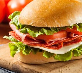 italian sub sandwich easy classic italian hoagie recipe, Close up image of an Italian Sub Sandwich on a cutting board