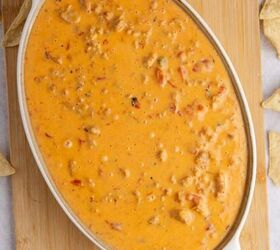 non alcoholic frozen paloma, Spicy Sausage Queso in an oval dish from above with corn chips all around