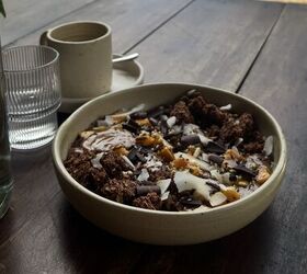chocolate smoothie bowl with chocolate granola coconut flakes mango