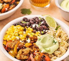 quick air fryer chicken fajita bowl 30 minute weeknight meal, Chicken fajita bowl with vibrant peppers black beans and corn topped with fresh cilantro and lime wedges