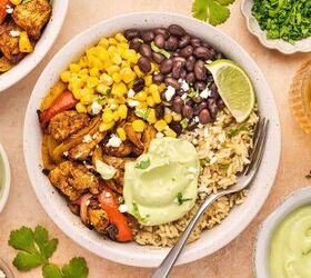 quick air fryer chicken fajita bowl 30 minute weeknight meal, Chicken fajita bowl featuring juicy chicken saut ed peppers black beans and creamy avocado sauce in a rustic bowl