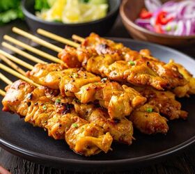 chicken satay recipe easy satay chicken, Close up image of Chicken Satay stacked on a plate