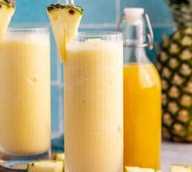 non alcoholic frozen pina colada, Two glasses of non alcoholic frozen Pina coladas on a tray