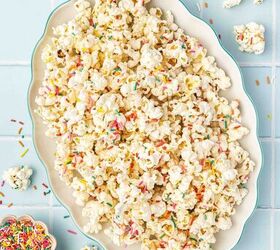 3 ingredient funfetti popcorn recipe easy no bake treat, 3 ingredient funfetti popcorn clusters served on a platter as a sweet no bake snack