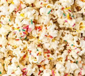 3 ingredient funfetti popcorn recipe easy no bake treat, No bake funfetti popcorn clusters arranged neatly on a serving platter with sprinkles