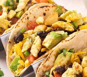 easy mexican chocolate cake recipe from cake mix, Close up of breakfast tacos in a taco stand filled with pico scrambled eggs potatoes black beans and fresh toppings