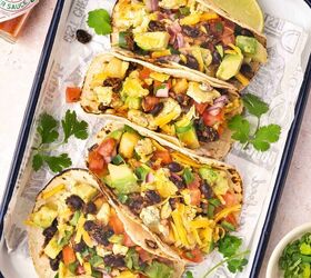 easy breakfast tacos with pico scrambled eggs, Platter of breakfast tacos with pico de gallo scrambled eggs potatoes black beans cheese and avocado