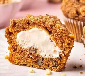 easy breakfast tacos with pico scrambled eggs, Close up of a carrot cake muffin cut open revealing creamy cheesecake filling in the center with walnut streusel on top