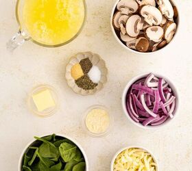 easy egg white frittata fluffy high protein, Top down view of ingredients for a dish a pitcher of beaten egg whites bowls of sliced mushrooms red onion strips fresh spinach shredded cheese a pat of butter and small dishes of spices and grated cheese
