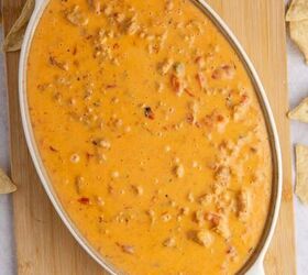 chicken tinga tostadas easy slow cooker recipe, Spicy Sausage Queso in an oval dish from above with corn chips all around