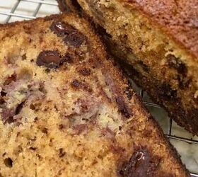 blueberry yogurt muffins with crumble topping, banana bread with chocolate chips on a cooling rack
