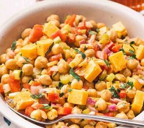 easy buffalo chickpea salad quick meal prep friendly, Detailed close up of buffalo chickpea salad highlighting lightly mashed chickpeas mixed with vegetables and coated in buffalo sauce