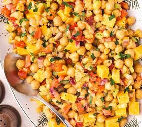 easy buffalo chickpea salad quick meal prep friendly, Buffalo chickpea salad served on a white platter against a bright background highlighting the vibrant colors of the ingredients