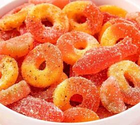 easy red white blue snack mix 4th of july no bake recipe, Colorful Mexican chamoy candy in a bowl with Peach Rings Sour Patch Watermelon and Swedish Fish coated in chamoy sugar and Taj n
