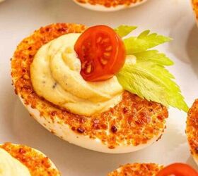easy tuna chickpea salad sandwich recipe protein packed lunch, Taj n coated Bloody Mary deviled eggs arranged on a serving platter with celery olives pickles and cherry tomatoes