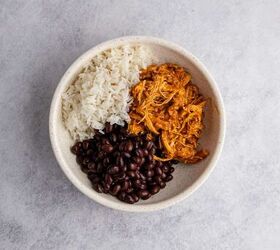 chicken tinga bowl perfect for weekly meal prep, Chicken Tinga bowl being made on a counter with rice and beans
