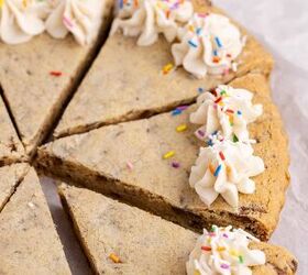 giant chocolate chip cookie cake bakery style easy to make, Chocolate chip cookie cake with white icing and rainbow sprinkles