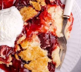 3 ingredient strawberry dump cake the easiest dessert you ll make, Strawberry Dump Cake from above up close with a fork on the plate