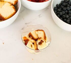 easy no bake parfait cups with fresh berries, Cubed pound cake added as the second layer in a berry parfait cup dessert