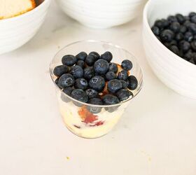 easy no bake parfait cups with fresh berries, Fresh blueberries layered into a clear parfait cup with cake pudding and strawberries