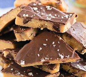 easy no bake cookie dough bark edible safe to eat, A plate stacked with pieces of homemade cookie dough topped with a layer of chocolate and sprinkled with flaky sea salt
