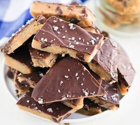 easy no bake cookie dough bark edible safe to eat, A bowl filled with pieces of cookie dough bark topped with sea salt The dough has a thick chocolate layer and is arranged in a stacked pile on a white plate