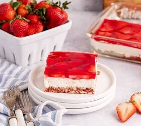 classic strawberry pretzel salad creamy crunchy, Strawberry Pretzel Salad on a plate with strawberries in the back