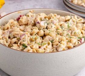 red white and blue pretzel salad made in a square pan, Cold Tuna Pasta Salad in a serving bowl with a plateful in the back