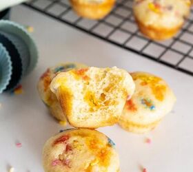 easy birthday cake mini muffins with sprinkles, Close up of a fluffy birthday cake mini muffin with colorful sprinkles and soft crumb texture