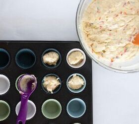 easy birthday cake mini muffins with sprinkles, Scooping birthday cake mini muffin batter into silicone lined mini muffin pan