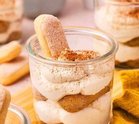 the best no bake tiramisu cheesecake cups mini dessert in jars, Close up of no bake tiramisu dessert cups with mascarpone cream and cocoa dusting in small jars