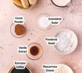 the best no bake tiramisu cheesecake cups mini dessert in jars, Flat lay of ingredients for no bake tiramisu cups including mascarpone cheese heavy cream coffee sugar vanilla and ladyfinger biscuits arranged on a table