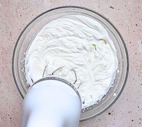 the best no bake tiramisu cheesecake cups mini dessert in jars, Medium bowl of heavy cream whipped to stiff peaks for no bake tiramisu cheesecake cups