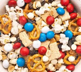 the best cinnamon sugar oyster crackers recipe, Red white and blue snack mix in bowl with popcorn pretzels graham crackers and M M s for 4th of July